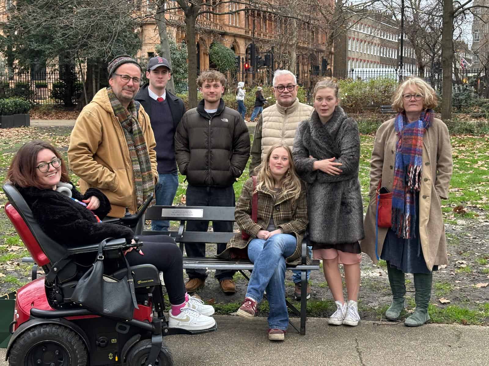 Margaret’s family around her bench
